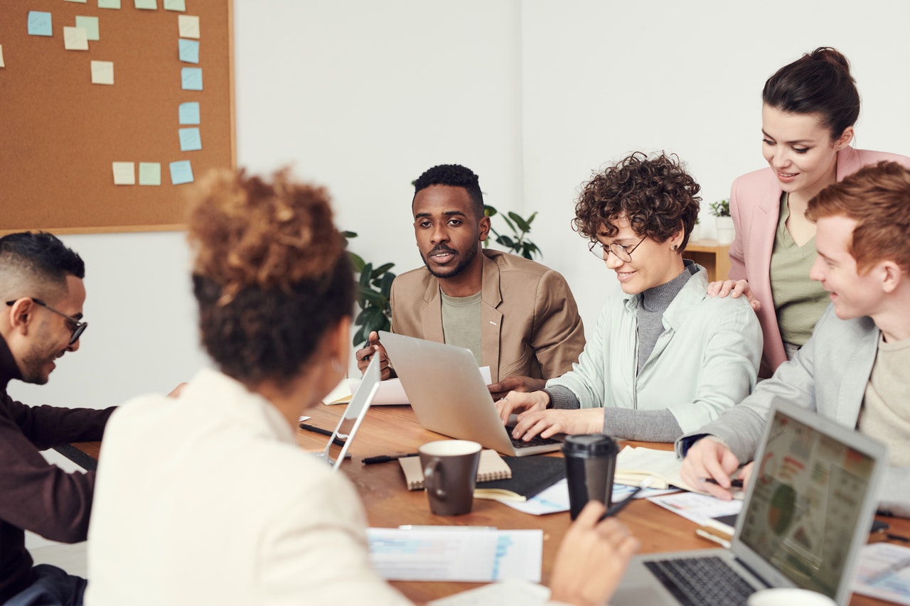 People communicating in workplace meeting