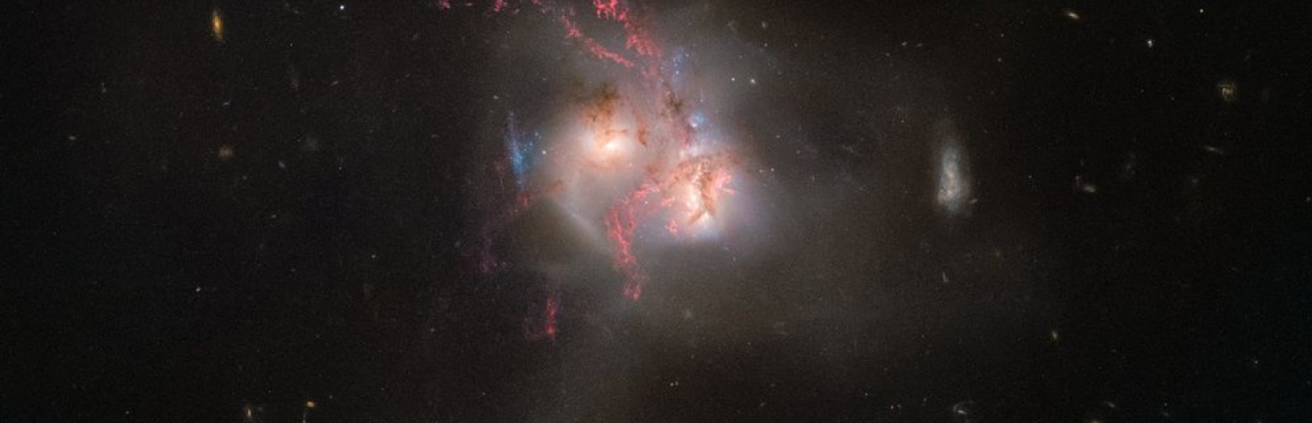 Cosmic Crash: Galaxies Head for Collision in Stunning Hubble Image