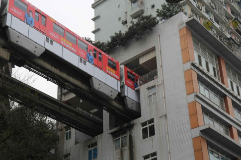 There&apos;s no need to walk to the train, if you live in this building. It comes to you.