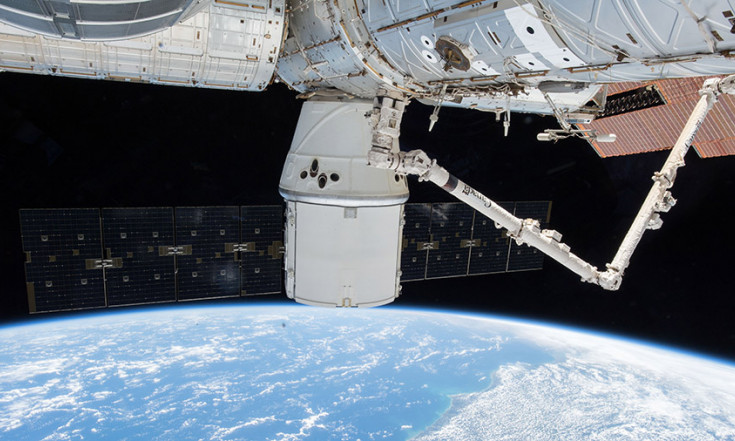 Crew Prepping Dragon for Departure While Studying Life Science – Space Station