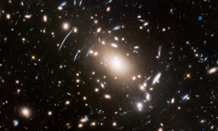 ESA Science & Technology: Hubble discovers `wobbling galaxies` - Observations may hint at nature of dark matter [heic1718]
