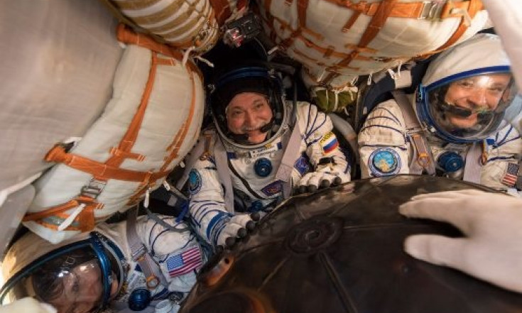 Safe Soyuz Touchdown at Sunrise Returns U.S.-Russian Crew after...