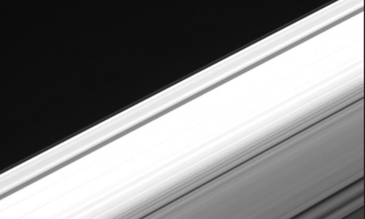 Watch as NASA`s Cassini Speeds Past Saturn`s Rings in This...